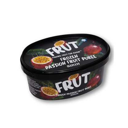 Black FRUT frozen passion fruit seedless pulp packaging with green leaf designs on a white background