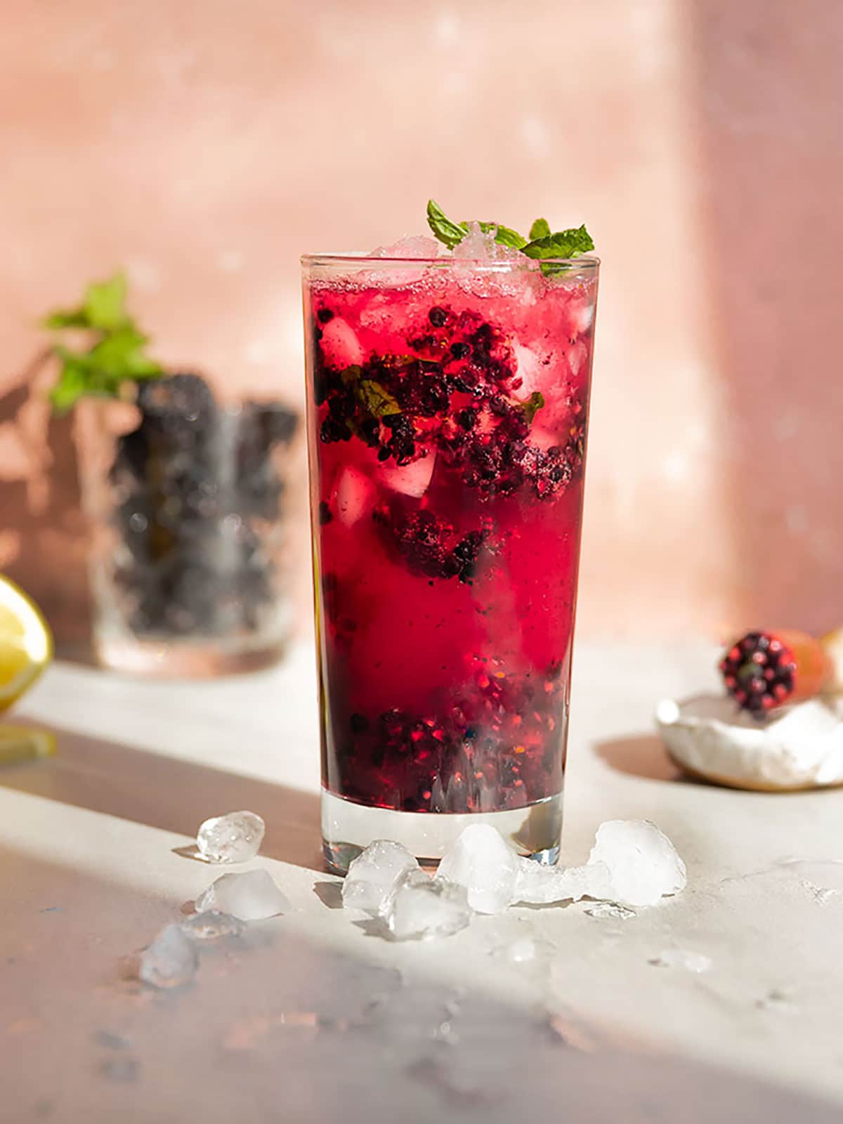 6. Blackberry Lemon Cooler (5 min)  
Ingredients  
½ cup frozen blackberries  
2 tbsp lemon juice  
1½ cups cold water  
Honey to taste  

How to Make  
Blend all ingredients until smooth. Strain if desired. Serve chilled. This drink is sharp and refreshing, showing that frozen blackberries aren’t just for desserts.
